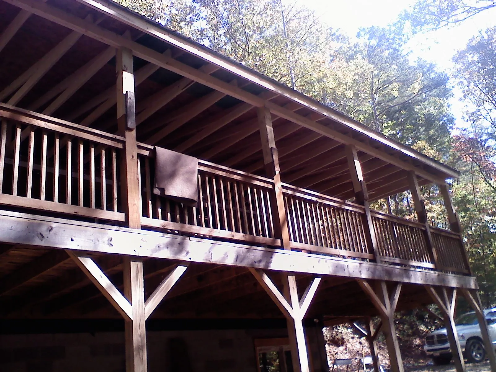 Timber framing under a new elevated porch and deck — Roof Leak Repair in Cogan Station by Roofing Brothers